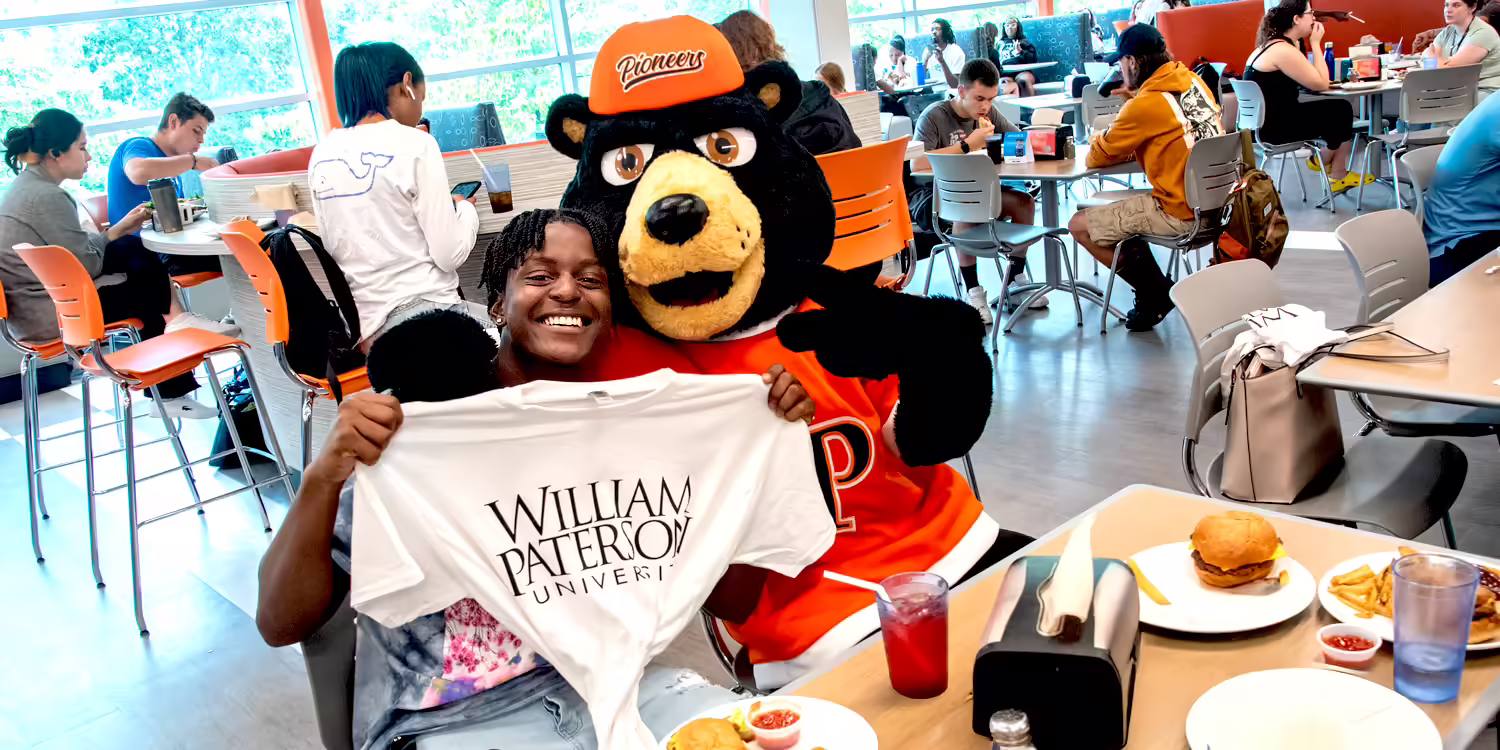 Students in the dining hall with Pio