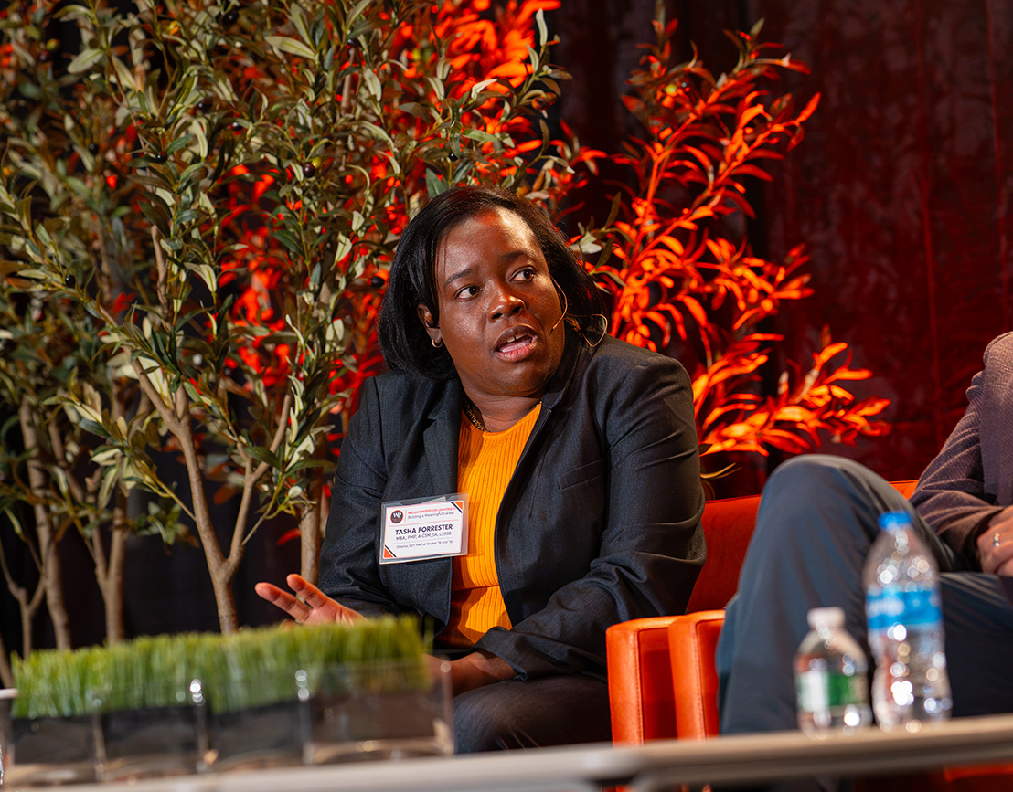 Tasha Forrester takes a question during the alumni panel.