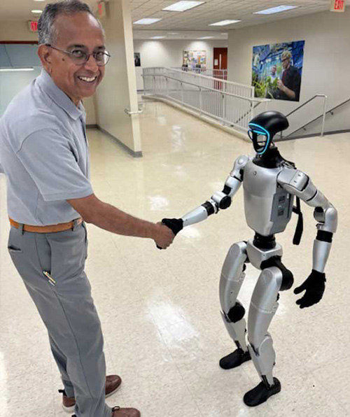 College of Science and Health dean with robot
