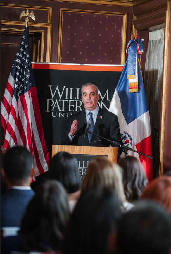 President Luis Abinader addresses the crowd in Hobart Manor.