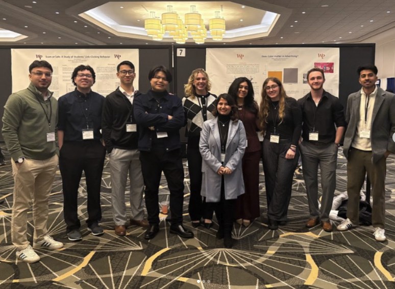 William Paterson students gathered together at an academic poster presentation
